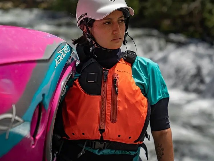 Essential kayaking safety gear including life jacket, whistle, and rope for beginners
